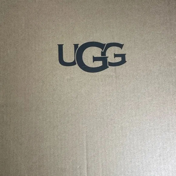 size 6 in kids brand new Ugg slides